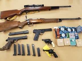 Guns, ammunition and drugs were seized in a London police raid at a home on Hillcrest Avenue.(Police supplied photo)