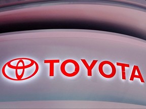 The Toyota logo is seen at a booth during a media day for the Auto Shanghai show in Shanghai, China, April 19, 2021.