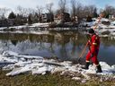 Volunteer firefighter Greg St. Clair walks the banks of the Thames River in St. Marys on Thursday March 10, 2022, five days into the search for a missing 10-year-old girl who fell through ice on Whirl Creek in Mitchell.  Chris MontaniniStratford Beacon Herald