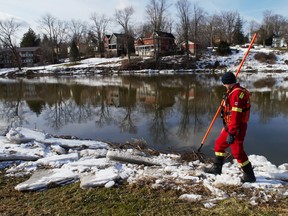 Volunteer firefighter Greg St. Clair walks the banks of the Thames River in St. Marys on Thursday March 10, 2022, five days into the search for a missing 10-year-old girl who fell through ice on Whirl Creek in Mitchell. Chris Montanini\Stratford Beacon Herald