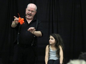 Peter Mennie showcases his balloon chihuahua at the Kenora Recreation Centre in this Postmedia file photo. Ryan Stelter/Miner and News