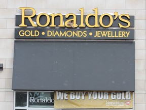 An employee at Ronaldo's Jewelry was injured during a gun-point robbery at the Wharncliffe Road business on Friday. Investigators have recovered the getaway vehicle, but no suspects have been arrested. (Dale Carruthers/The London Free Press)