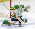 London Knights goalie Owen Flores makes a save against the Windsor Spitfires at Budweiser Gardens in London on Dec. 11, 2021. (Derek Ruttan/The London Free Press)