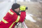 A firefighter scans Whirl Creek near Mitchell on Monday, March 7, 2022, for signs of a 10-year-old girl who fell through ice into the creek on Sunday morning.  (Derek Ruttan/The London Free Press)