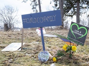 A handmade sign is part of a memorial to the Afzaal family at the corner of Hyde Park and South Carriage roads in London. Photograph taken on Monday, March 14, 2022. (Derek Ruttan/The London Free Press)