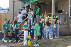 A St. Patrick's Day party started before noon at this house on Mill Street in London, Ontario. Thursday, March 17, 2022. (Derek Ruttan/The London Free Press)