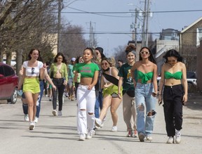 Partygoers head out to a St. Patrick's Day celebration at The Belfort, a nightclub on London's Piccadilly Street.  (Derek Ruttan/The London Free Press)