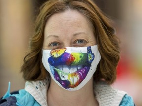 Crystal St Martin wears a fun mask in White Oaks Mall in London on Friday, March 4, 2022.  Ontario may lift its mask mandate at the end of March, but Middlesex-London's acting medical officer of health is recommending people stick with them well into the spring. (Mike Hensen/The London Free Press)