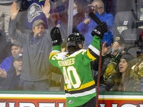 Antonio Stranges, of the London Knights, celebrates with fans after he went coast to coast for a goal during the first period of their game against the Owen Sound Attack at Budweiser Gardens in London, Ont., on Friday March 25, 2022. (Mike Hensen/The London Free Press)