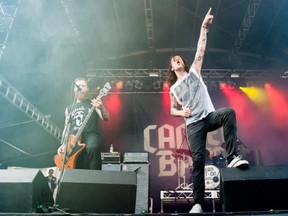 Jaye Schwarzer, left, a Clarke Road secondary school alum, performs with his bandmates in Cancer Bats. (Photo: Wikipedia)