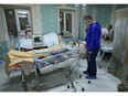 Pregnant women and newborn babies shelter in the basement of a maternity hospital in Kyiv that has been converted into a medical ward and used as a bomb shelter during air raid alerts.