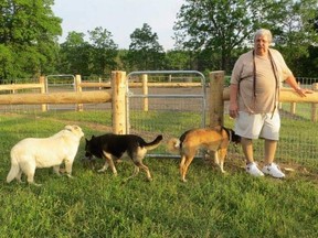Longtime St. Thomas animal care advocate Joe Spencer, seen here in one of the city dog parks he pushed to create, died knowing his quest for a new animal care centre would be realized, his family says. (Submitted)