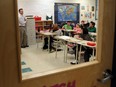 This file photo shows a teacher in his classroom.
