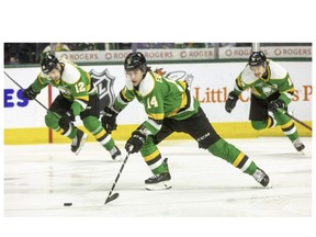Luke Evangelista rushes up the ice with London Knights teammates Tye McSorley and Sean McGurn during Game 2 of their first-round playoff series against Kitchener at Budweiser Gardens in London. The Knights won, 5-2. Photograph taken on Friday April 22, 2022. Mike Hensen/The London Free Press