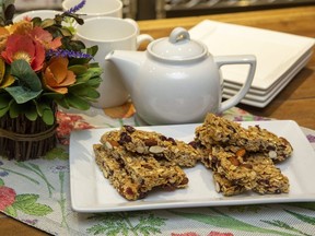 These sweet, chewy and easy-to-make granola bars offer a healthy mix of oats, nuts and seeds, Jill Wilcox says. (Food styling by Ran Ai) (Derek Ruttan/The London Free Press)