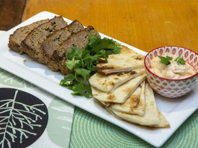 North African spices, tangy yogurt tahini sauce and naan take traditional meat loaf in a tasty new direction, Jill Wilcox says. (Derek Ruttan/The London Free Press)