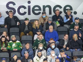 Some fans wear masks and some don't during the London Knights game against the Guelph Storm at Budweiser Gardens in London on Sunday April 10, 2022. (Derek Ruttan/The London Free Press)