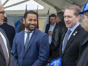 Kapil Lakhotia, chief executive of the London Economic Development Corp., left, and Mayor Josh Morgan are shown in this LFP file photo.