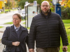 Herbert Hildebrandt and his wife walk into court at the Elgin County Courthouse in St. Thomas on Oct. 22, 2021. (London Free Press file photo)