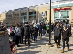 Crowd line up at Budweiser Gardens. (Mike Hensen/The London Free Press)