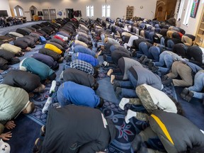 Worshippers pray Friday, April 1, 2022, at the London Muslim Mosque on Oxford Street in London. Ramadan, the holy month of fasting and prayer for Muslims, begins this weekend. (Mike Hensen/The London Free Press)