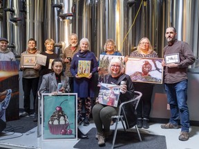 12 artists works are featured on cans of London Brewing Co-Op's Black lager for The annual London Artists' Studio Tour. (Mike Hensen/The London Free Press)