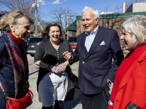 Kate Graham, London North Centre Ontario Liberal candidate, second from left, chats with Shelley Peterson, left, former Ontario premier David Peterson and former MPP and deputy premier Deb Matthews on Thursday at the opening of her campaign office on Thursday, April 21, 2022. (Mike Hensen/The London Free Press)