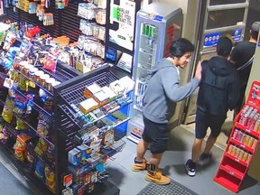 Surveillance footage from an Ultramar gas station on Adelaide Street shows Thou Roeun, 38, and two relatives exiting with a smile after buying cigarettes minutes before he was fatally struck by a car in a hit-and-run at Adelaide and Nelson streets around 9:30 p.m. on April 23, 2022.
