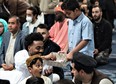 Thousands of worshippers gathered at London Muslim Mosque throughout the day Monday for Eid al-Fitr, the holy day celebrating the end of Ramadan, a month when Muslims refrain from eating or drinking from dawn until dusk.  DALE CARRUTHERS/THE LONDON FREE PRESS