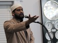 Imam Aarij Anwer leads prayer at the London Muslim Mosque, where thousands of worshippers gathered throughout the day Monday for Eid al-Fitr, the holy day celebrating the end of Ramadan, a month when Muslims refrain from eating or drinking from dawn until dusk. Photo taken May 2, 2022. DALE CARRUTHERS/THE LONDON FREE PRESS