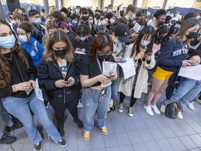 Dawson College students send simultaneous emails to their MNAs during an anti-Bill 96 rally organized by the Dawson Student Union at the CEGEP in Montreal on Thursday, May 5, 2022.