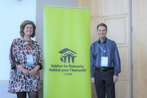 Julia Deans, chief executive of Habitat for Humanity Canada, and Alan MacKinnon, board chair with Habitat for Humanity Heartland Ontario, are among Habitat officials from across Canada attending the agency's national conference at RBC Place in London.  Photograph taken Thursday, May 12, 2022. (MEGAN STACEY/The London Free Press)