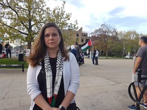 Balkis Dargouth was one of about 100 people who turned out Friday evening at a Victoria Park vigil in honour of Palestinian journalist Shireen Abu Akleh. (London Free Press photo)
