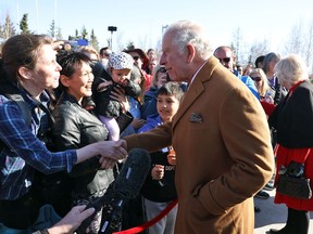 Prince Charles and Camilla, Duchess of Cornwall, greet people in Yellowknife, N.W.T., on the final day of their Royal visit to Canada, May 19, 2022.