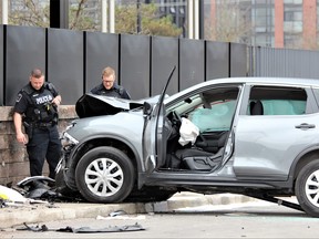 A woman was taken to hospital with life-threatening injuries after an SUV drove through a parking lot bus shelter before crashing into Masonville Place mall on Tuesday May 3, 2022 at around 9 a.m. DALE CARRUTHERS / THE LONDON FREE PRESS