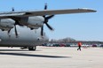 A CC-130H Hercules aircraft, like the one shown here at the London International Airport on Saturday, will be one of two military aircraft taking part in search-and-rescue training near St. Thomas and Lake Erie from Monday to Friday. DALE CARRUTHERS / THE LONDON FREE PRESS