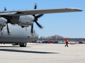 A CC-130H Hercules aircraft, like the one shown here at the London International Airport on Saturday, will be one of two military aircraft taking part in search-and-rescue training near St. Thomas and Lake Erie from Monday to Friday. DALE CARRUTHERS / THE LONDON FREE PRESS