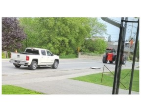 Police say they're looking for a white pickup truck and a tractor in connection with the theft of Pride flags in Oxford County, east of London. OPP photo