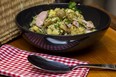 This tasty take on potato salad, featuring smoked sausage and dill pickles, is a hearty dish that will satisfy the most robust appetite, Jill Wilcox says. (Derek Ruttan/The London Free Press)