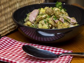 This tasty take on potato salad, featuring smoked sausage and dill pickles, is a hearty dish that will satisfy the most robust appetite, Jill Wilcox says. (Derek Ruttan/The London Free Press)