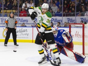 London Knight Max McCue screens Kitchener Rangers goalie Pavel Cajan in Game 5 on Tuesday, May 3, 2022, at the Memorial Auditorium in Kitchener. The Rangers won 5-2 to force Game 7 Wednesday in London. (Derek Ruttan/The London Free Press)