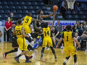 Jachai Taylor of the Windsor Express takes a shot during Game 1 of the semifinal series against the London Lightning at Budweiser Gardens in London on Sunday, May 15, 2022. The Lightning won 106-99. (Derek Ruttan/The London Free Press)