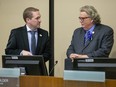 Mayor Ed Holder (right) speaks to deputy mayor Josh Morgan before the start of a  council meeting at City Hall. (Derek Ruttan/The London Free Press)