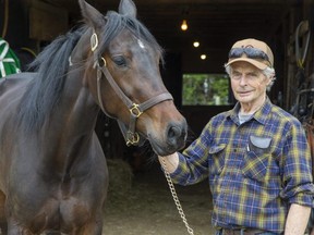 Don Beatson with his horse So Much More in Granton, Ontario. (Derek Ruttan/The London Free Press)