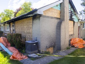 A home at 1281 Hillcrest Ave. in London was boarded up following a fire Feb. 1, but no other work has been done, neighbours say. Fifteen tenants were living in the unlicensed rental home when it caught fire. Photograph taken on Tuesday May 17, 2022. (Mike Hensen/The London Free Press)