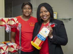 Funmi Ogunshote, right, and her daughter Tobi operate the Amazing Bakery in London. Funmi Ogunshote said the Foodpreneur Advantage program offered by the London Small Business Centre helped her increase the productivity of her bakery that makes Nigerian sweet bread. (Derek Ruttan/The London Free Press)