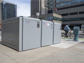 Bicycle lockers at the northeast corner of Wellington and Dundas streets and two other downtown locations installed last August by the city have only been used 100 times. (Derek Ruttan/The London Free Press)