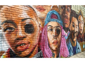 Aylmer Mayor Mary French said it's disheartening that a mural created by students in 2021 to celebrate inclusion and diversity was vandalized early Saturday. The mural is on the south wall of the Groovy Moon store at 20 John St. S. (Mike Hensen/The London Free Press)