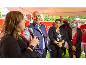 London North Centre candidate Kate Graham, left, introduces Ontario Liberal Party leader Steven Del Duca along with London West candidate Vanessa Lalonde and London Fanshawe candidate Zeba Hashmi during a visit by Del Duca to the London home of Graham's parents on Wednesday May 18, 2022. (Mike Hensen/The London Free Press)