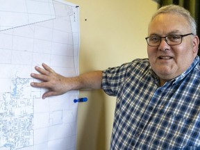 Mayor Joe Preston shows the rough location of an 800-acre (320-hectare) "mega-site" St. Thomas has put together in a bid to lure a large industrial plant as talk grows of another electric vehicle battery plant coming to Ontario. (Mike Hensen/The London Free Press)